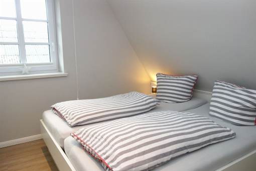 Ein zweites Schlafzimmer mit Doppelbett  180x200cm..