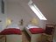 'Das Kinderzimmer mit zwei Einzelbetten, die sich problemlos zusammen schieben lassen (Hotelbetten)'